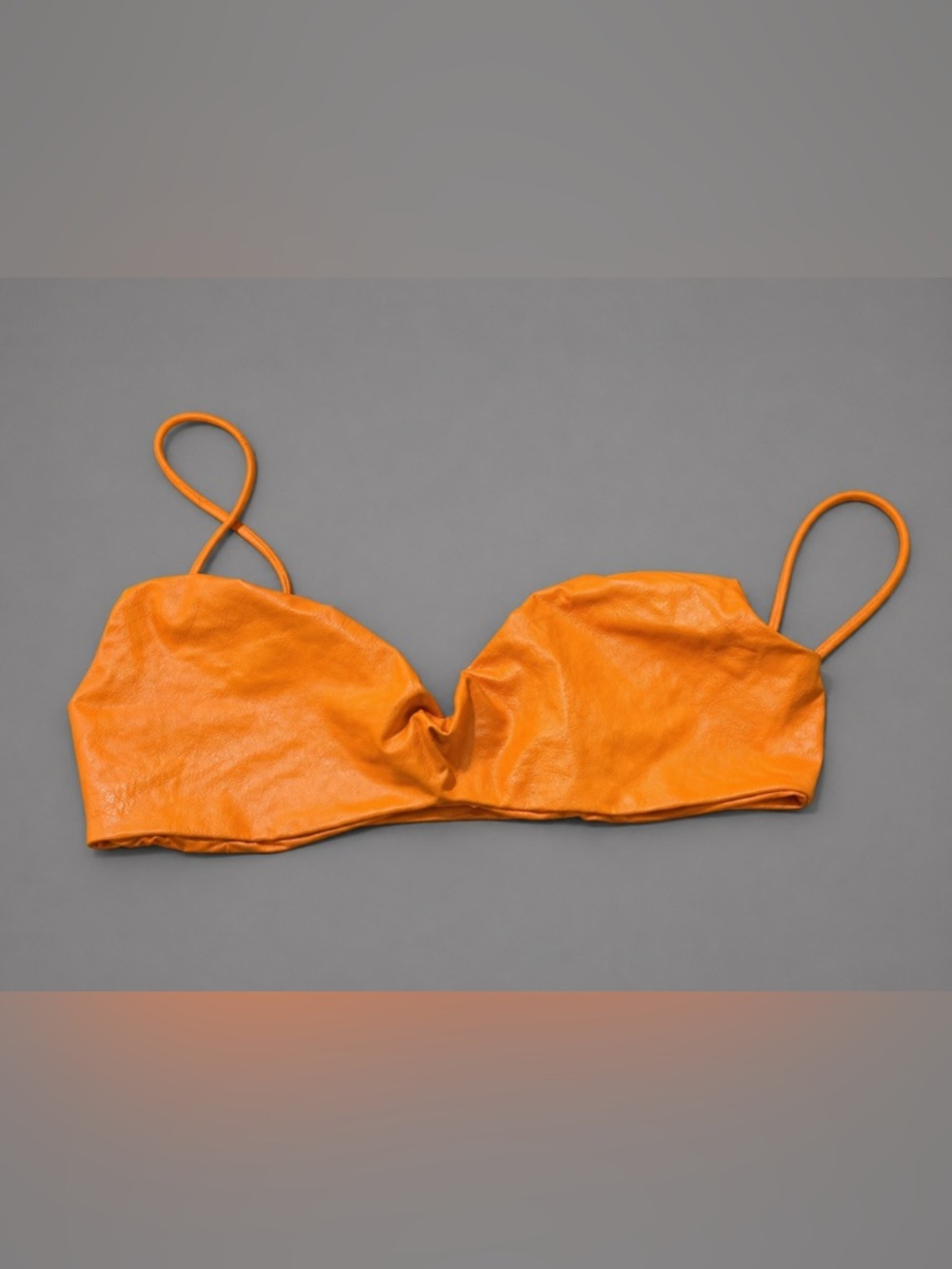 Naked Wardrobe orange faux leather bralette. 5/25